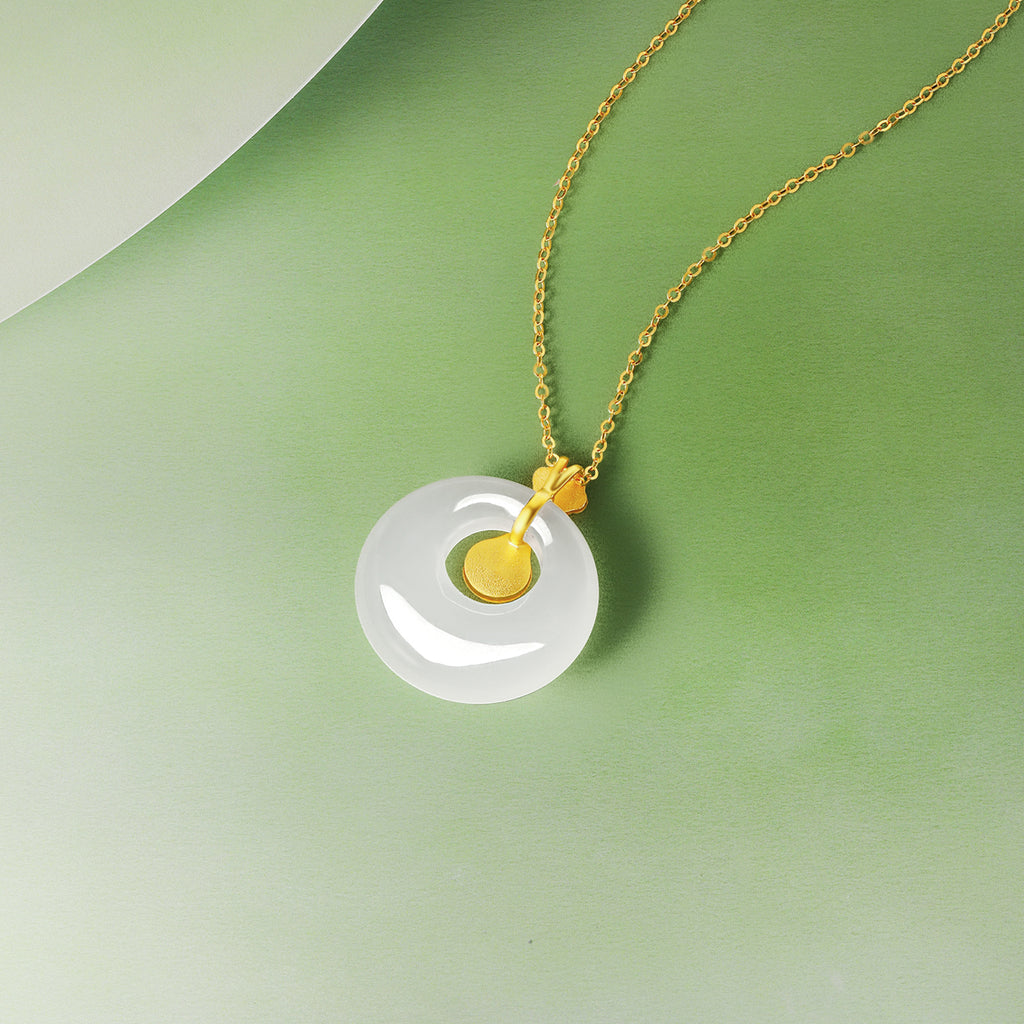 999.9 24K Gold Pendant Heitian Jade 0.8-1g Ping An Kou Y0411797