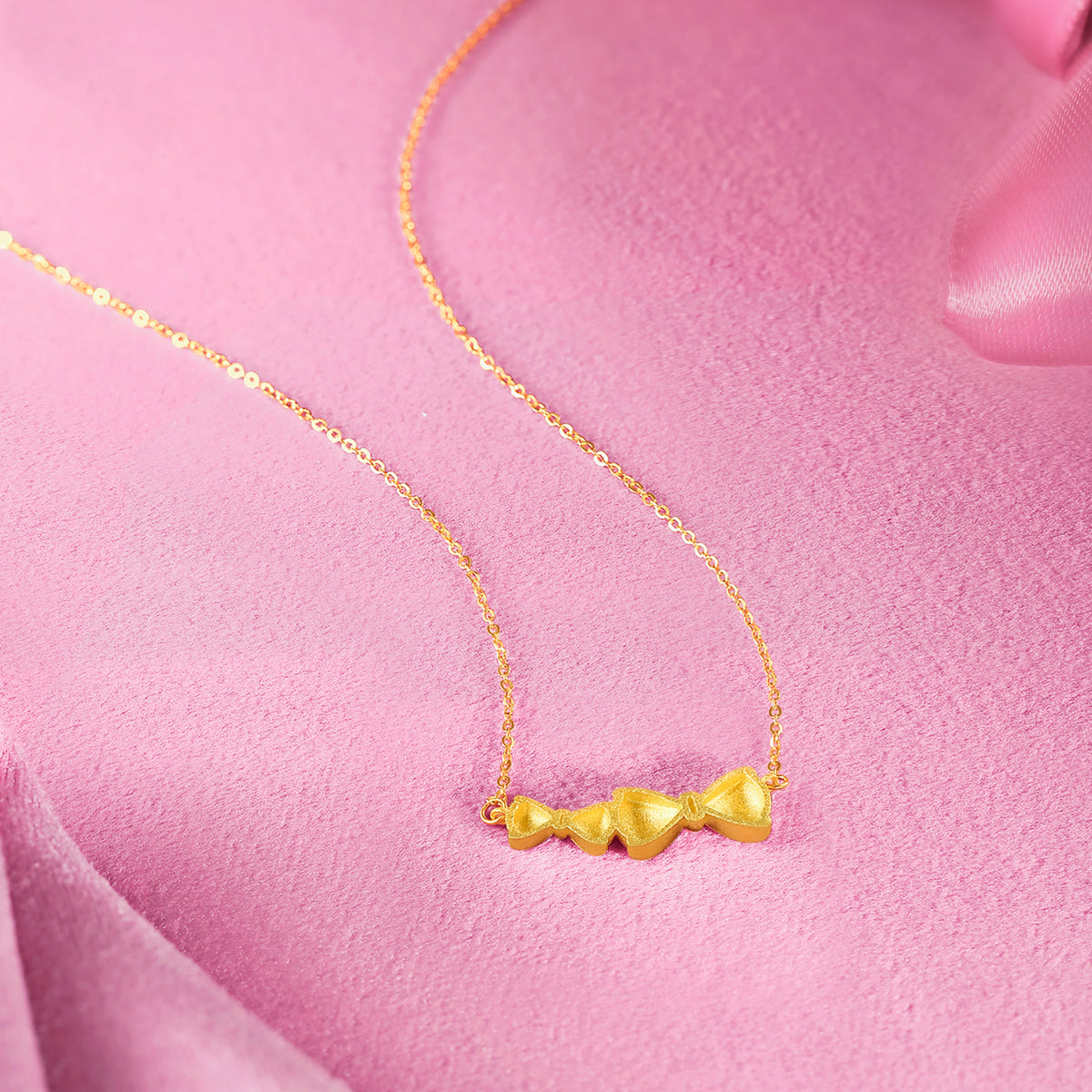 "Honey" 999 24K Gold Pendant Necklace Bow 3.16-3.66g A0613236