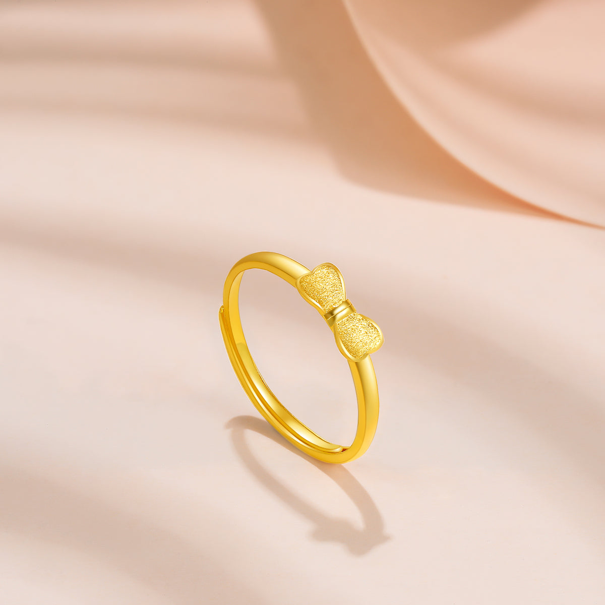 999 24K Gold Ring Bow 1.8-2.1g AA016686